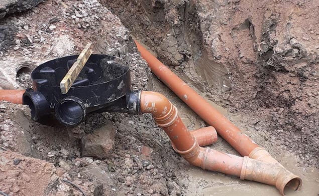 New drainage pipework exposed on a building project
